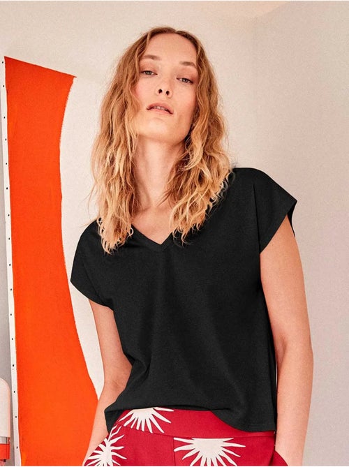 Camiseta sisa con escote pico en algodón y modal - Kiabi Camiseta sisa con escote pico en algodón y modal - Kiabi