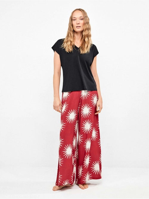 Camiseta sisa con escote pico en algodón y modal - Kiabi Camiseta sisa con escote pico en algodón y modal - Kiabi