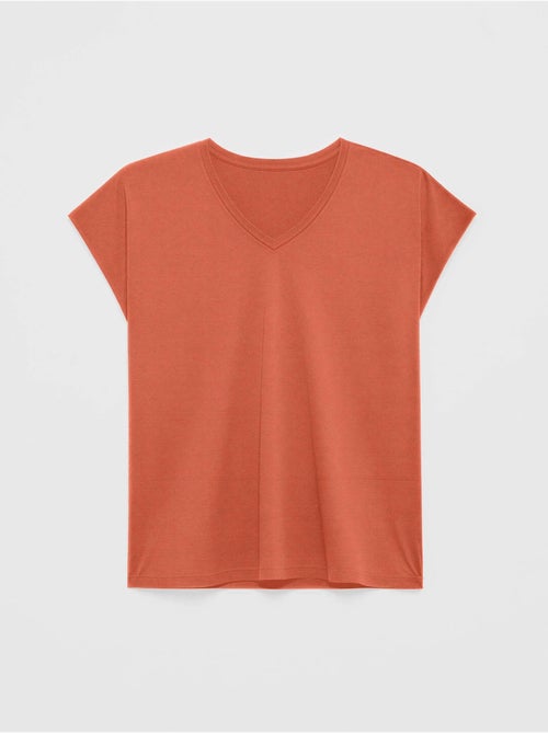 Camiseta sisa con escote pico en algodón y modal - Kiabi Camiseta sisa con escote pico en algodón y modal - Kiabi