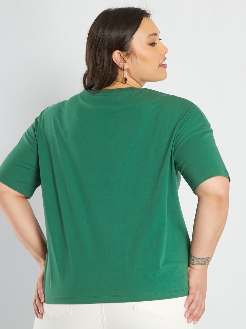 Camiseta 'Stranger Things' 'Hawkins' con sisa baja VERDE - Kiabi
