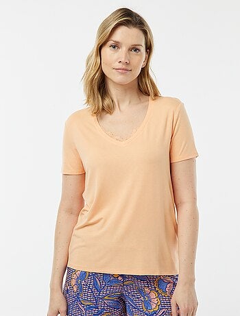 Camiseta vaporosa con cuello de pico