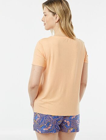Camiseta vaporosa con cuello de pico