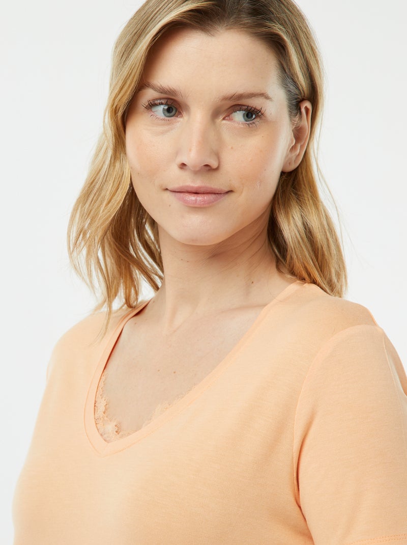 Camiseta vaporosa con cuello de pico Naranja - Kiabi