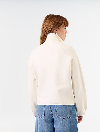 Cárdigan con cremallera y cuello alto
