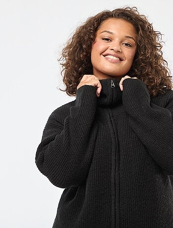 Chaleco con cremallera y cuello chimenea