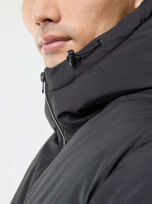 Cazadora acolchada larga con capucha lisa - Kiabi