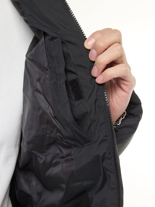 Cazadora acolchada larga con capucha lisa - Kiabi