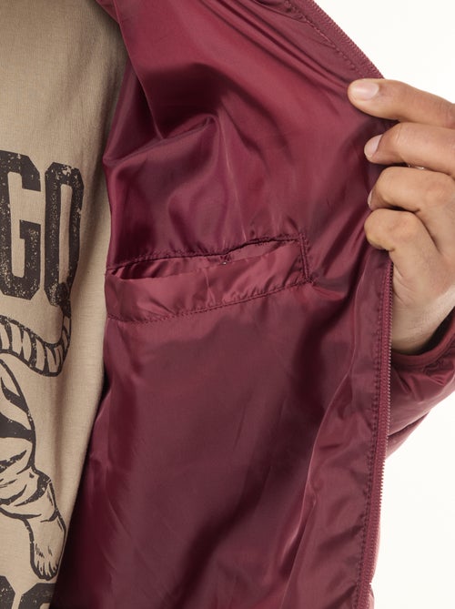 Cazadora acolchada ligera lisa de manga larga y cuello alto - Kiabi