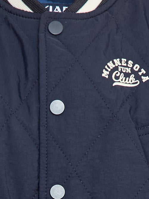 Cazadora con botones a presión en material acolchado - Kiabi