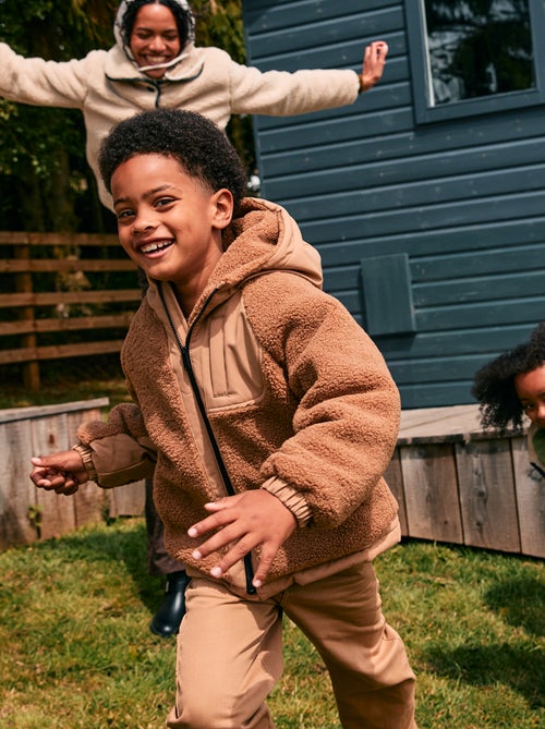 Cazadora con capucha bimateria efecto borreguito - Kiabi