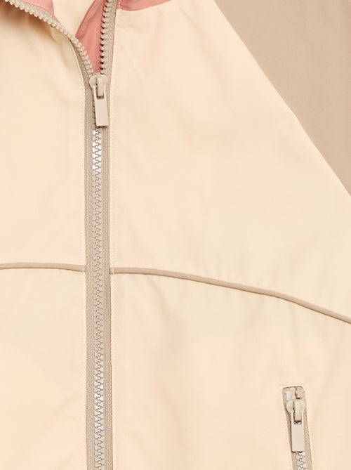 Cazadora cortavientos con capucha - Kiabi