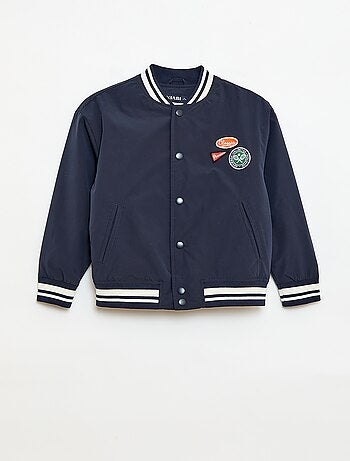 Cazadora estilo aviador con botones a presión