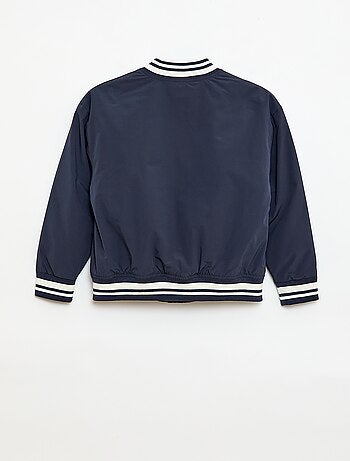 Cazadora estilo aviador con botones a presión