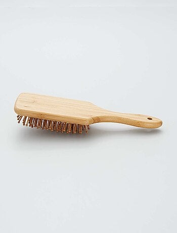 Cepillo con púas de madera