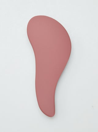 Cepillo curvado con púas