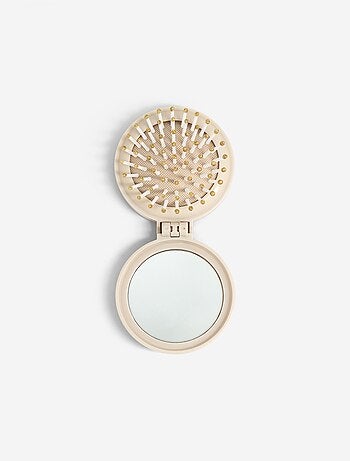 Cepillo para el pelo plegable con espejo