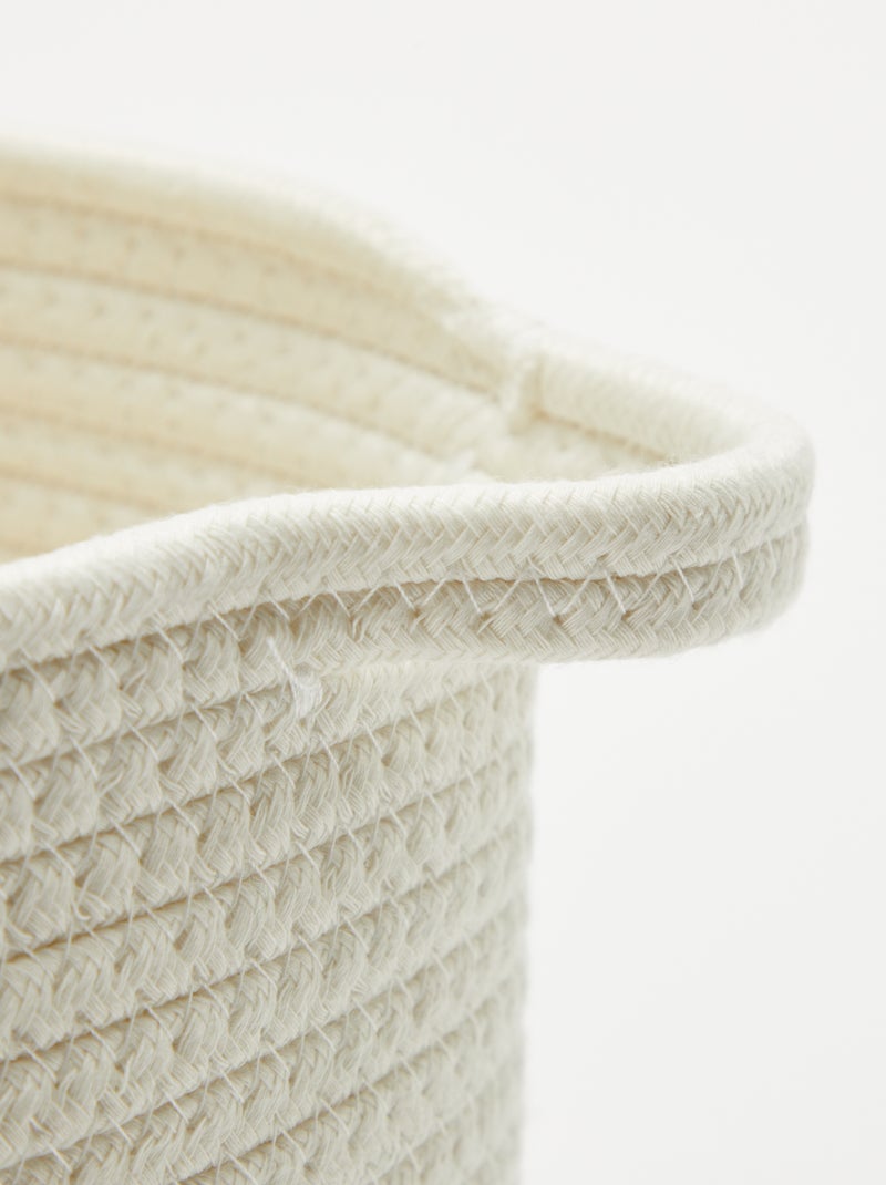 Cesta redonda de esparto 'Arcoíris' Rosa - Kiabi