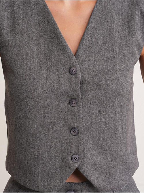 Chaleco abotonado con cuello en v mixray - Kiabi Chaleco abotonado con cuello en v mixray - Kiabi