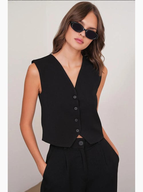 Chaleco abotonado con cuello en v mixray - Kiabi Chaleco abotonado con cuello en v mixray - Kiabi