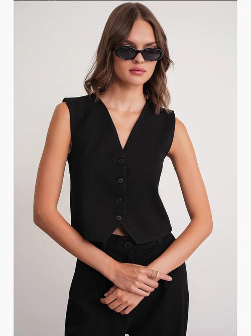 Chaleco abotonado con cuello en v mixray - Kiabi Chaleco abotonado con cuello en v mixray - Kiabi