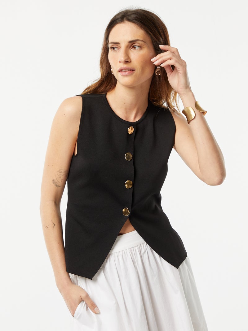 Chaleco con botones dorados negro - Kiabi