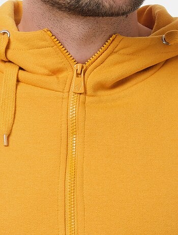 Chaleco con cremallera y capucha