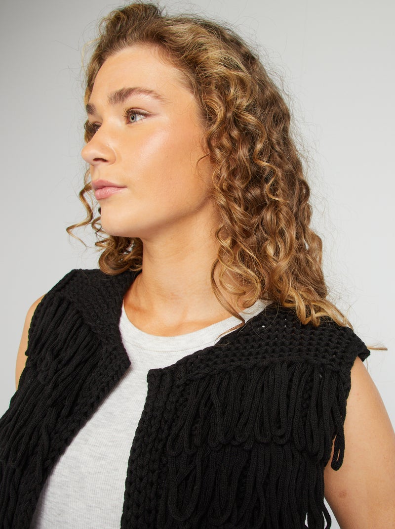 Chaleco con flecos negro - Kiabi
