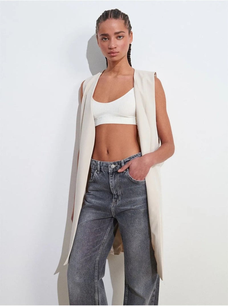 Chaleco largo de crepé tejido con detalle cut-out dilvin Crema - Kiabi