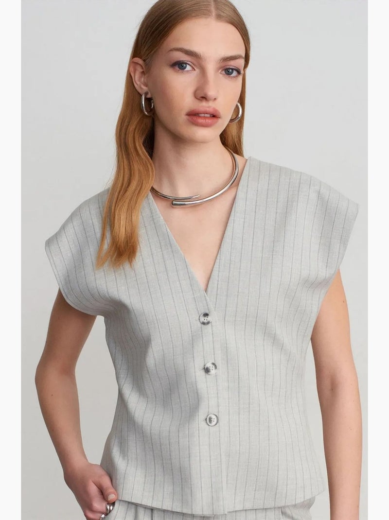 Chaleco tejido a rayas con cuello en v dilvin Gris claro - Kiabi