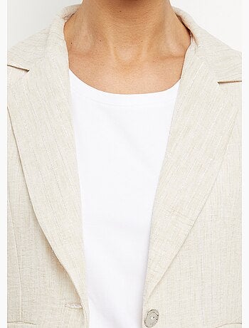 Chaqueta a rayas de corte sastre, de aspecto irregular. - Afibel