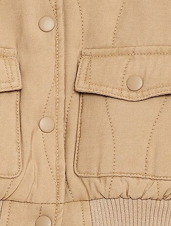 Chaqueta acolchada con automáticos