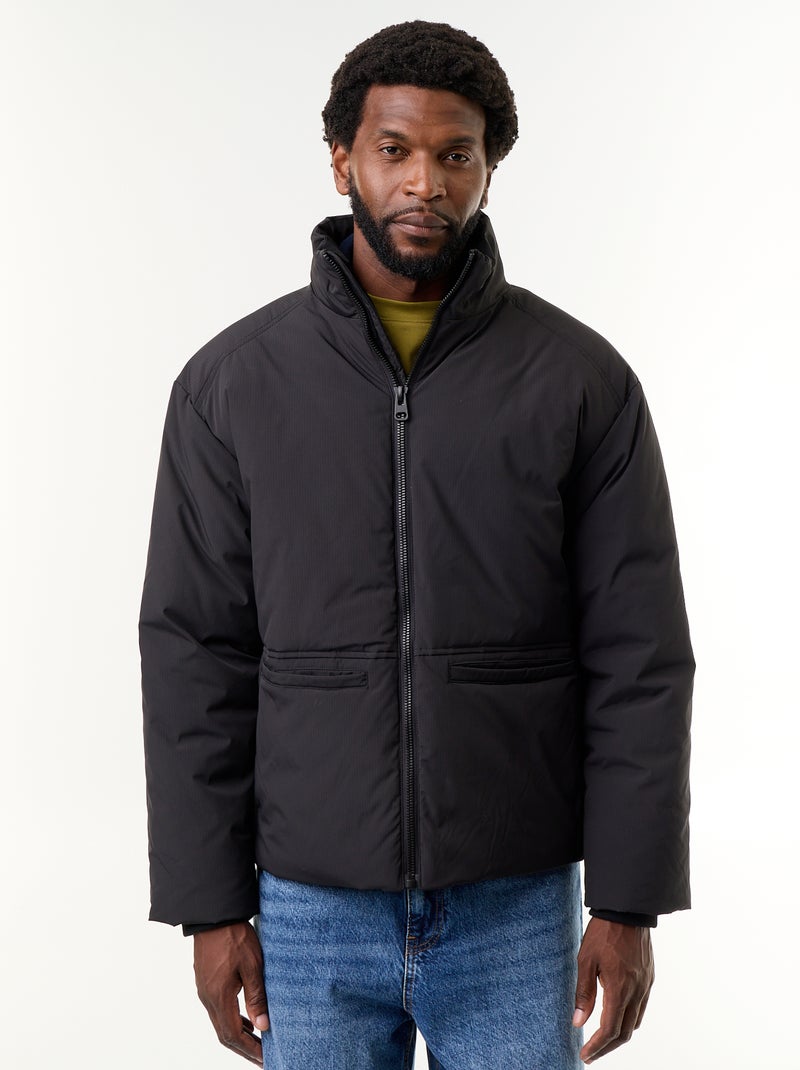 Chaqueta acolchada con cuello alto y mangas raglán Negro - Kiabi