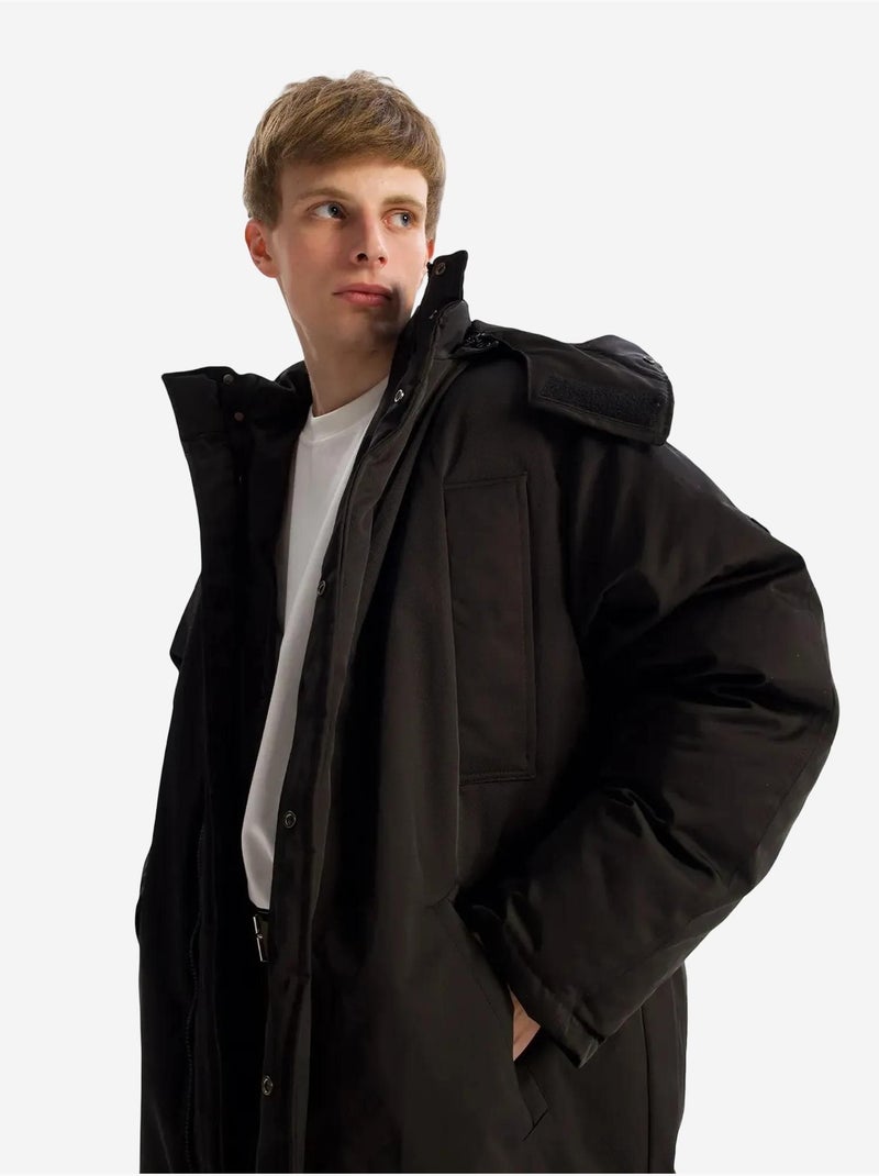 Chaqueta acolchada larga con capucha y bolsillos giesto Negro - Kiabi