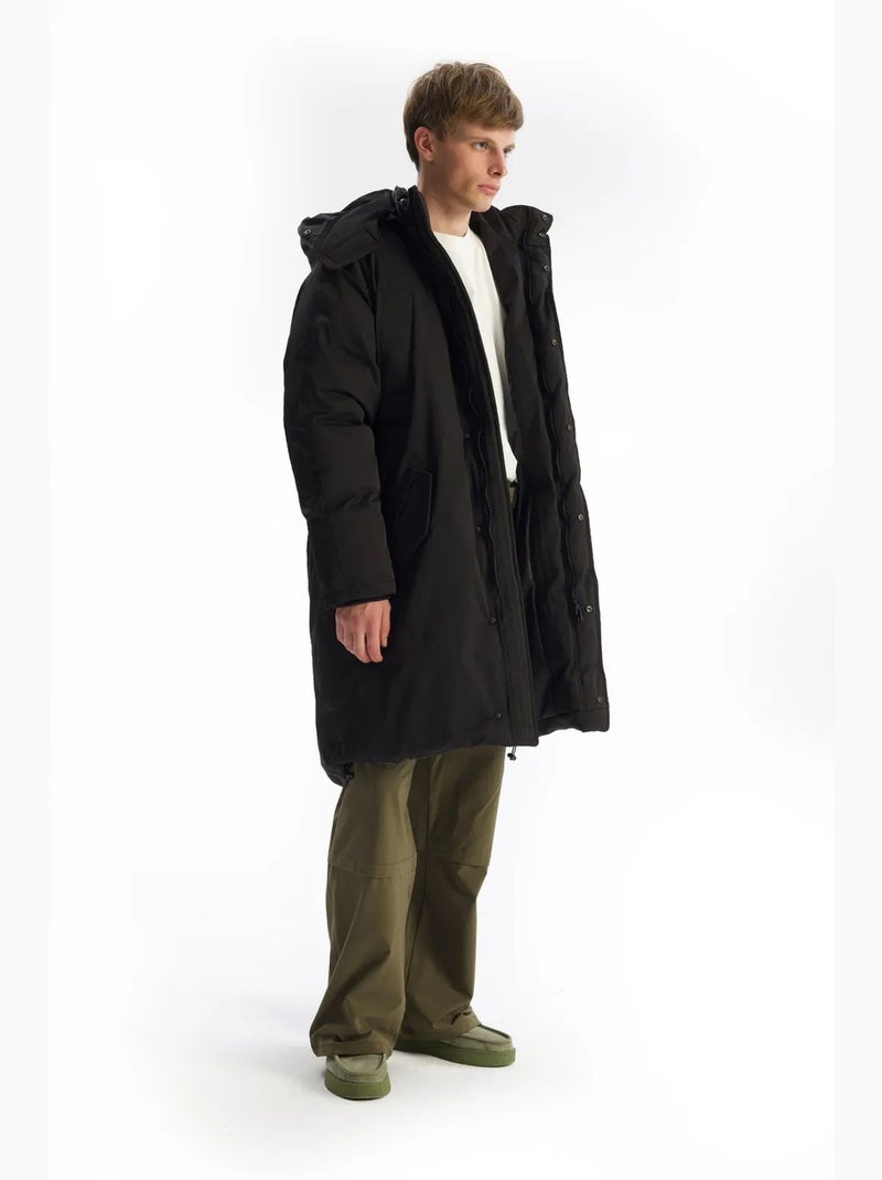 Chaqueta acolchada larga con capucha y bolsillos giesto Negro - Kiabi