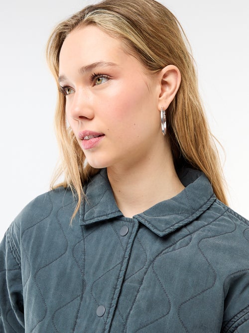 Chaqueta acolchada lisa con cuello camisero - Kiabi