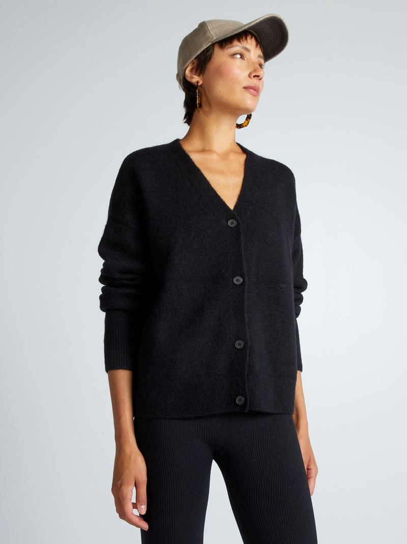 Chaqueta ancha con botones y cuello de pico negro - Kiabi