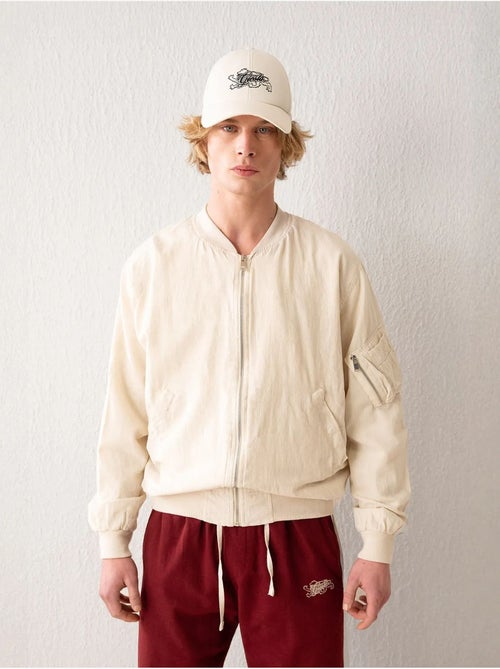 Chaqueta bomber de algodón con cremallera y bolsillo giesto - Kiabi Chaqueta bomber de algodón con cremallera y bolsillo giesto - Kiabi
