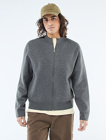 Chaqueta cálida con cremallera y cuello alto