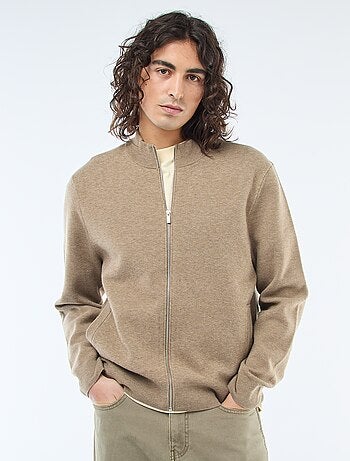 Chaqueta cálida con cremallera y cuello alto