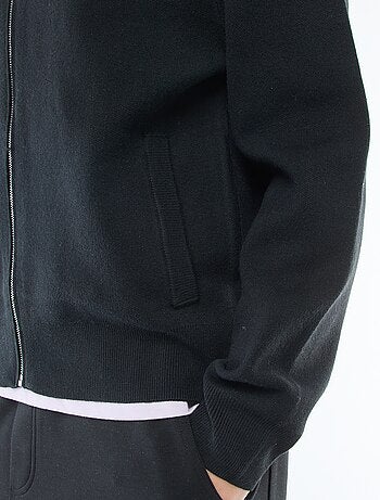 Chaqueta cálida con cremallera y cuello alto