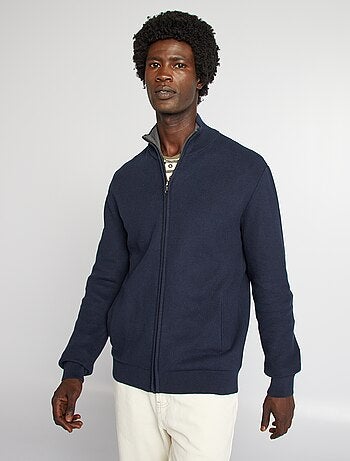 Chaqueta con cremallera cuello alto