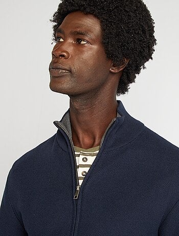 Chaqueta con cremallera cuello alto