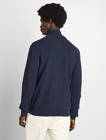 Chaqueta con cremallera cuello alto