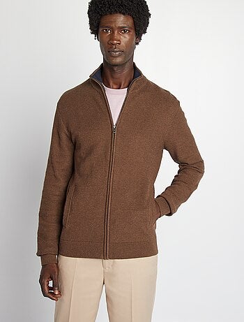 Chaqueta con cremallera cuello alto
