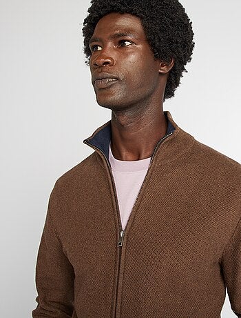 Chaqueta con cremallera cuello alto