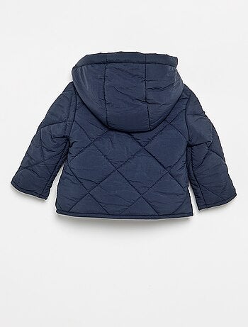 Chaqueta con cremallera y capucha