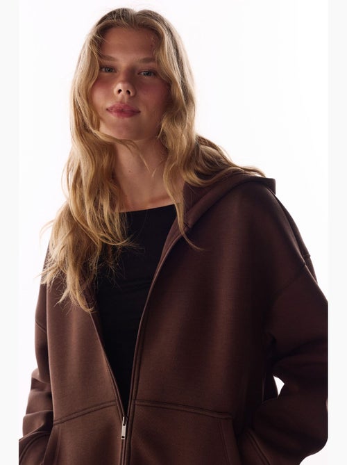 Chaqueta con cremallera y capucha de tejido scuba penti - Kiabi
