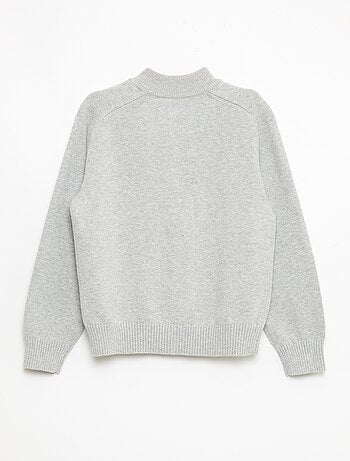 Chaqueta con cremallera y cuello alto