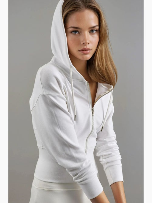 Chaqueta con cremallera y manga larga con capucha busem - Kiabi Chaqueta con cremallera y manga larga con capucha busem - Kiabi