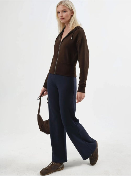 Chaqueta con cremallera y manga larga con capucha busem - Kiabi Chaqueta con cremallera y manga larga con capucha busem - Kiabi